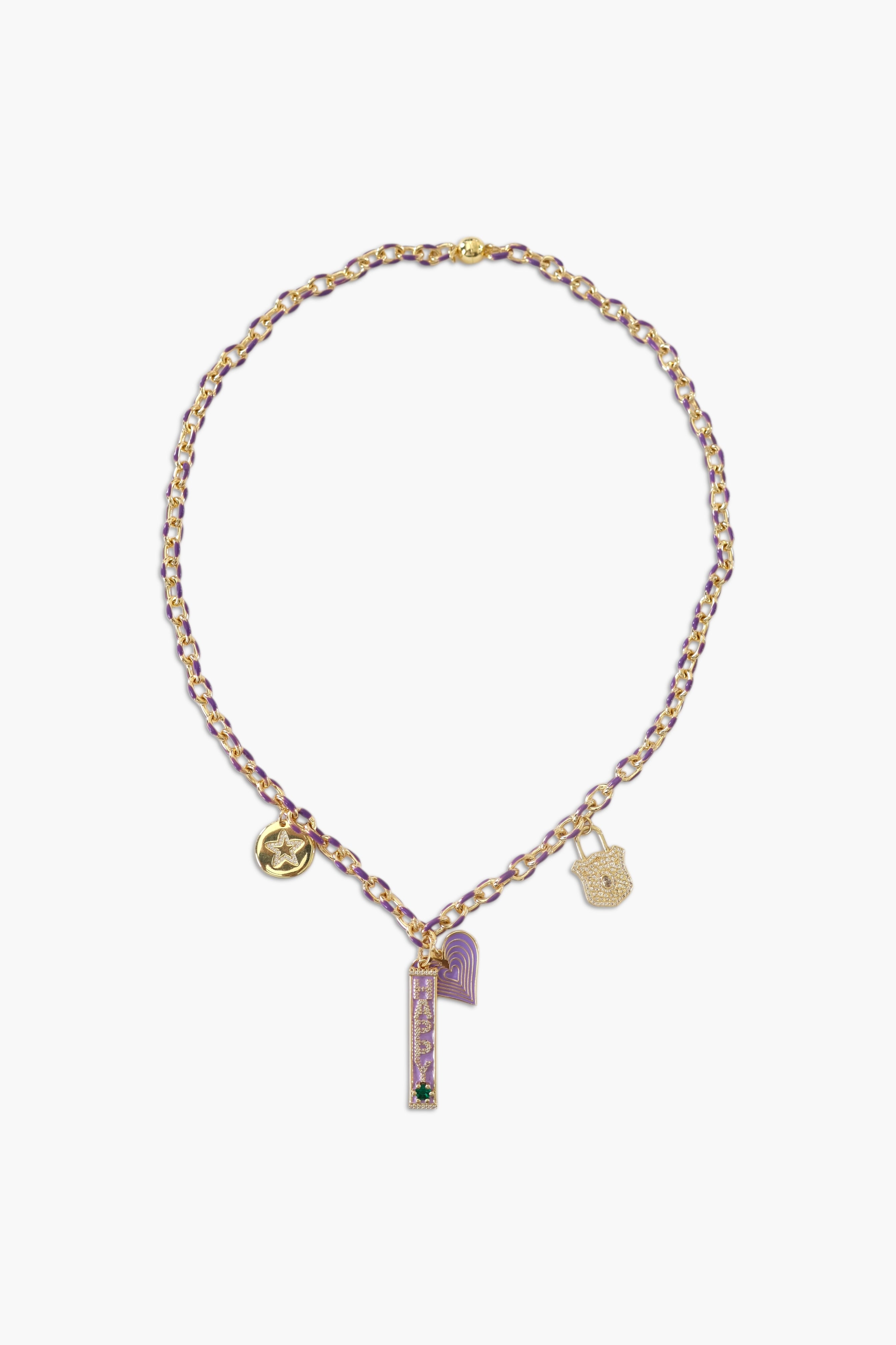 A person wearing multiple necklaces with amethyst stones and gold accents. The necklaces are part of a stack, and the person is holding some of the necklaces, showcasing the jewelry.