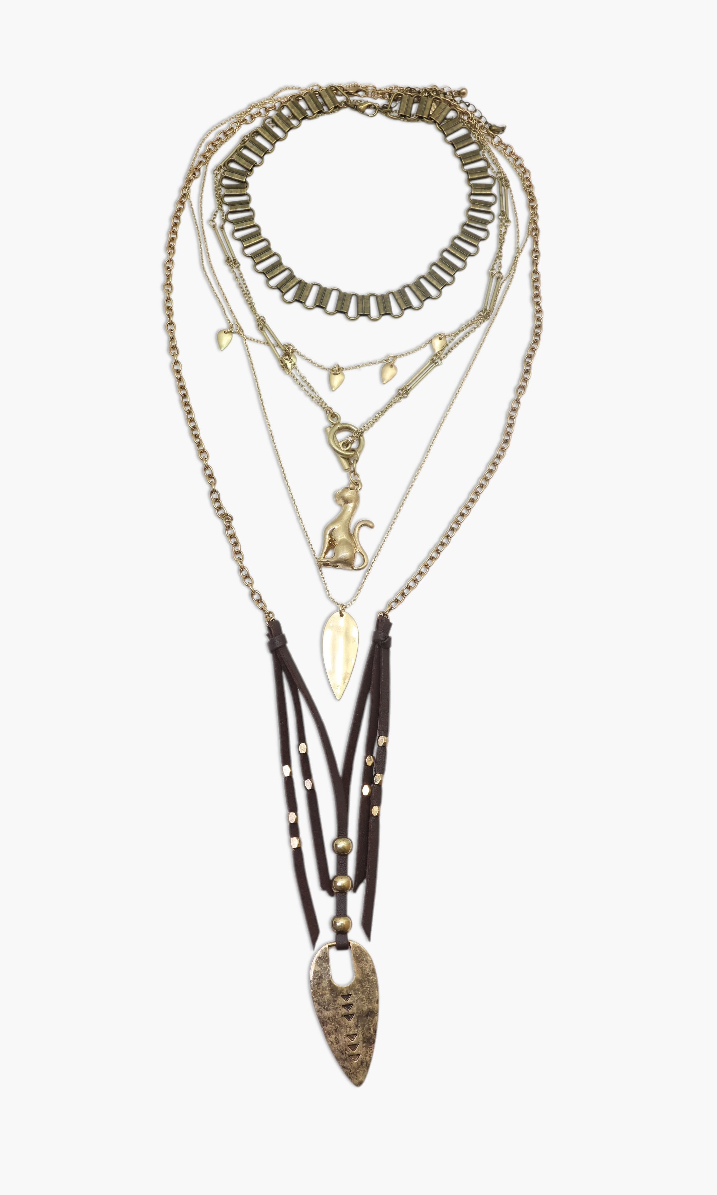 A layered brass necklace with various geometric shapes and a prominent arrowhead design.