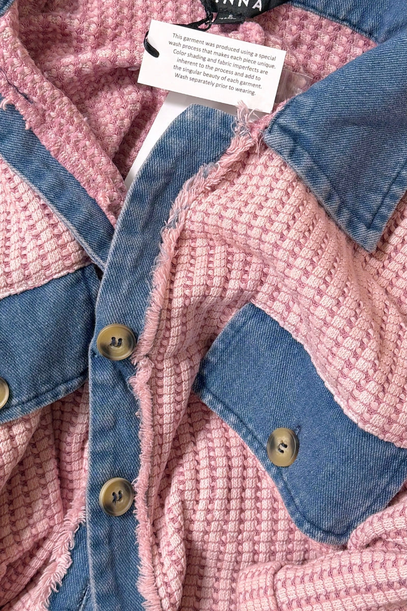 Women’s waffle knit button front romper with collared neckline, utility pockets, rolled short sleeves, and relaxed fit casual one-piece outfit for boutique fashion.