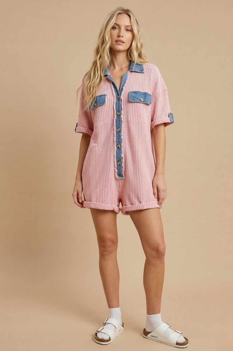 Women’s waffle knit button front romper with collared neckline, utility pockets, rolled short sleeves, and relaxed fit casual one-piece outfit for boutique fashion.
