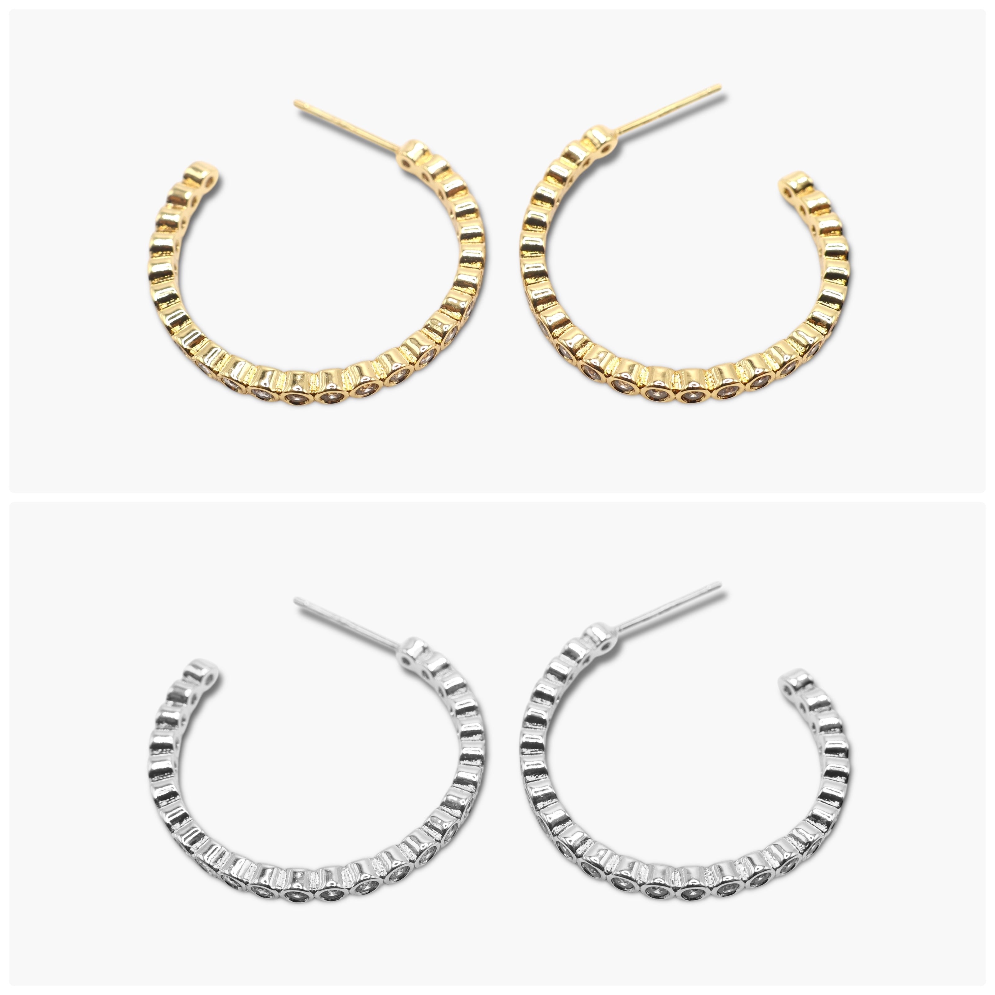 A pair of gold-colored hoop earrings with open hoops and sparkling stones, displayed against a white background.