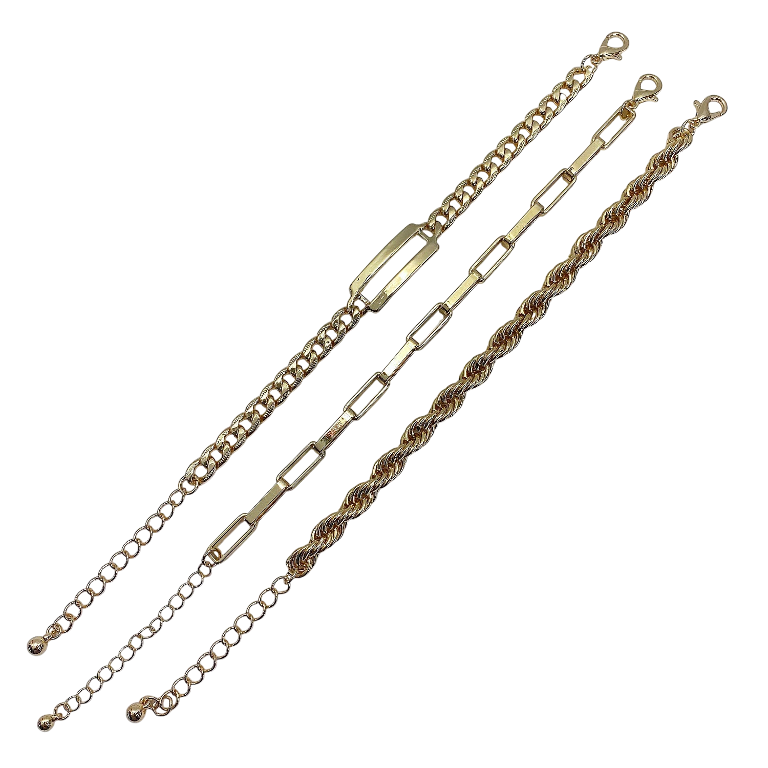 A three gold bracelets on a white background