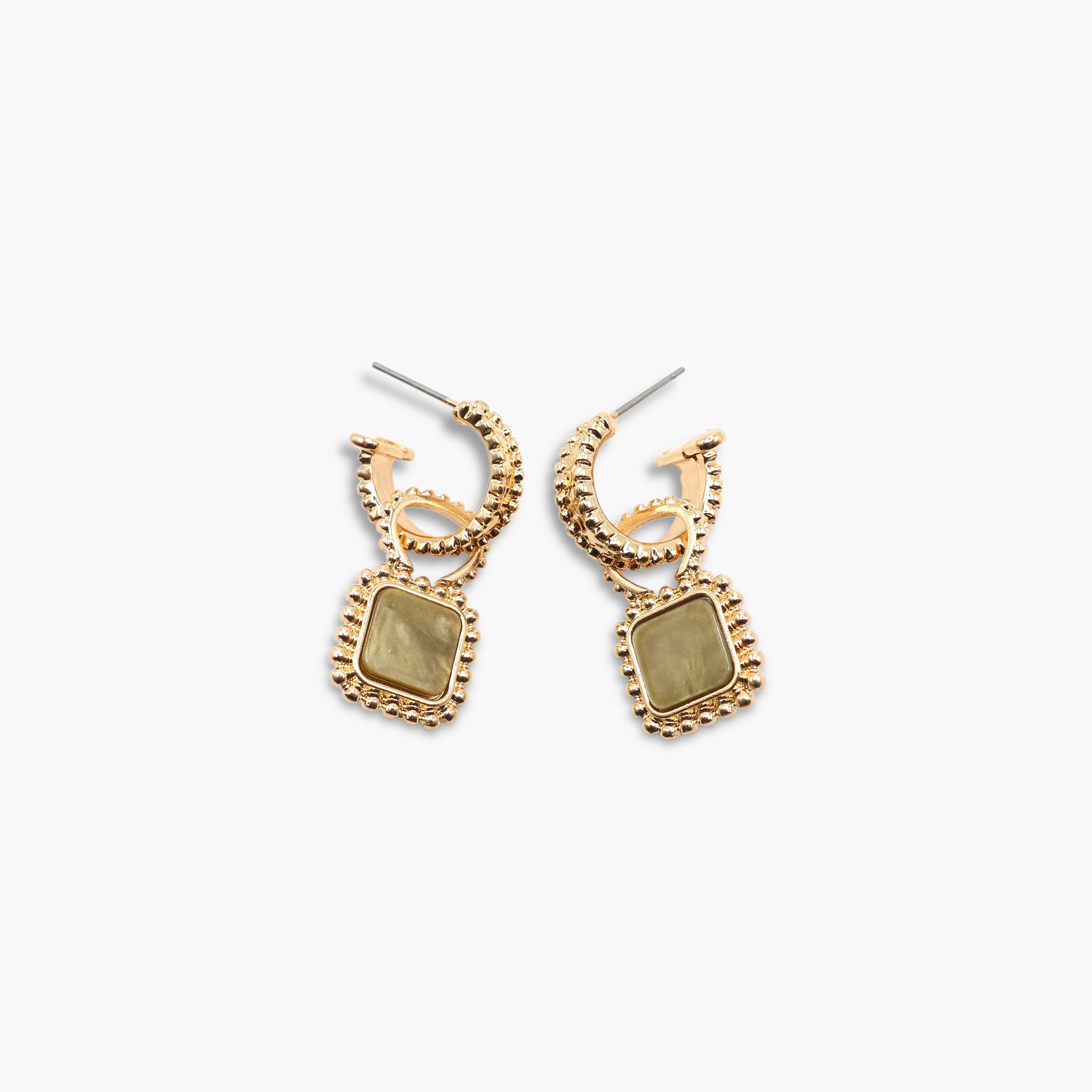 A pair of gold-colored hoop earrings with square-shaped gemstones attached to the hoops.