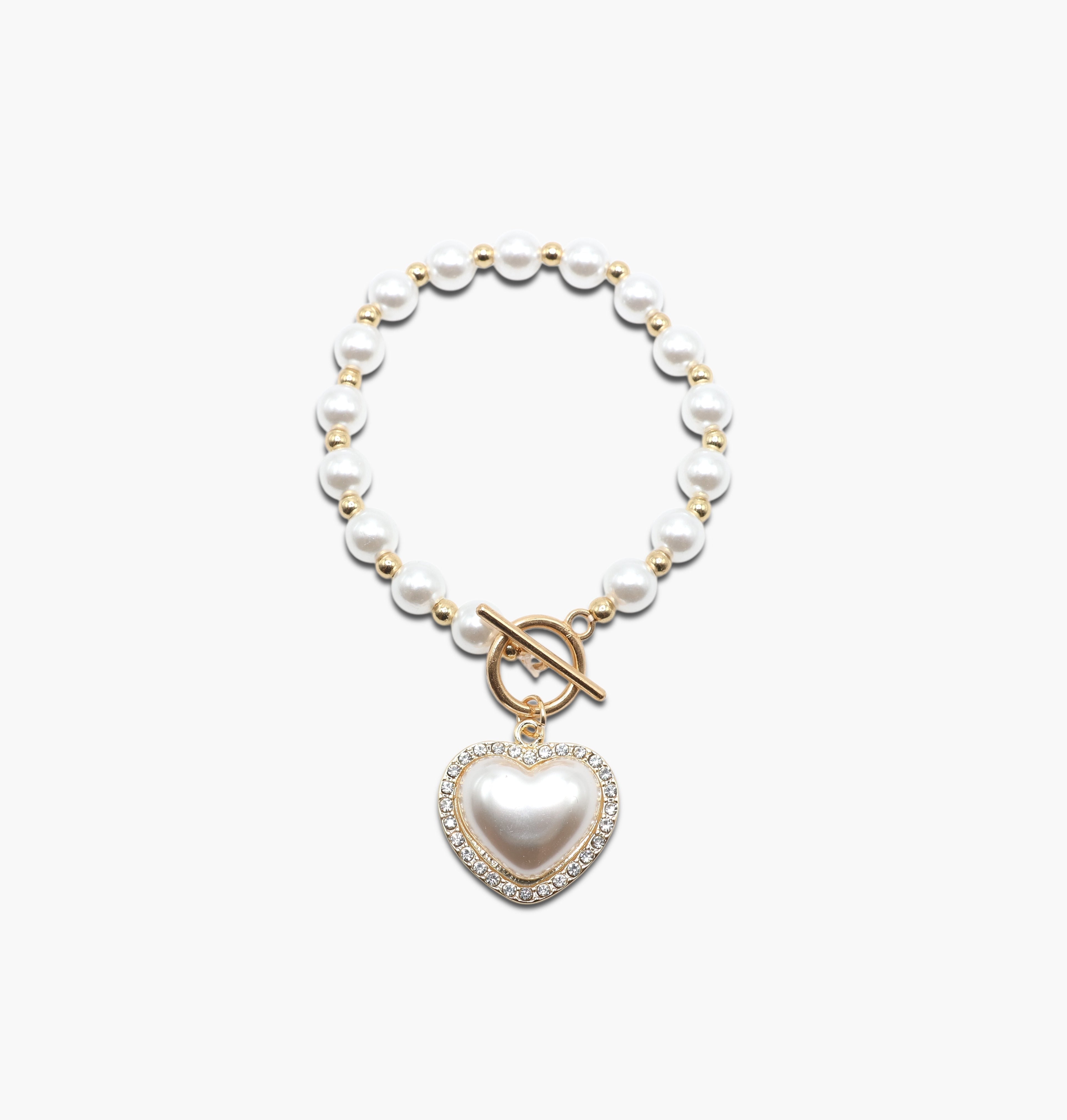 Pearl necklace with a heart-shaped pendant on a white background