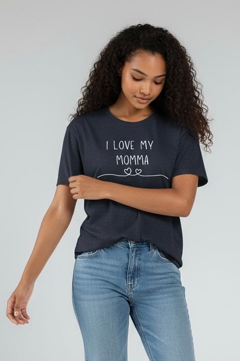 Woman wearing a gray t-shirt with 'I Love My Momma' text on a plain background