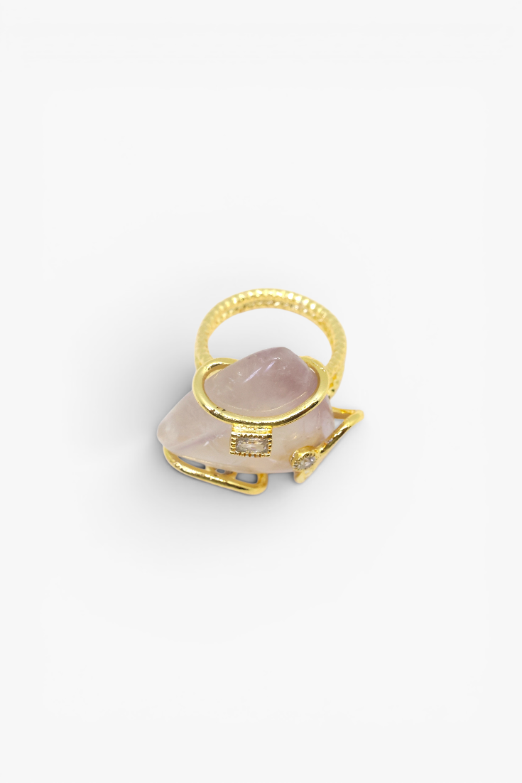 Natural stone statement ring with crystal accents in a gold-tone setting featuring an organic gemstone centerpiece.