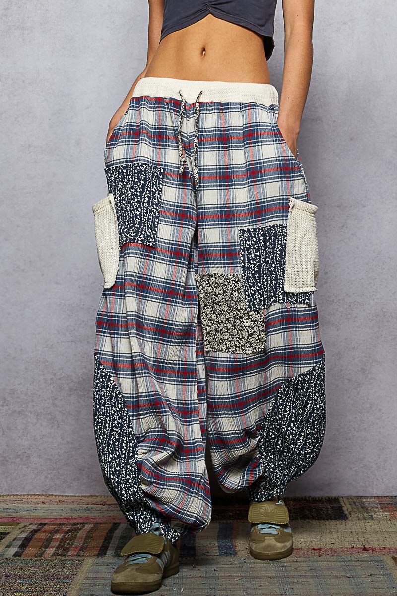 Plaid patchwork pants with a gray background