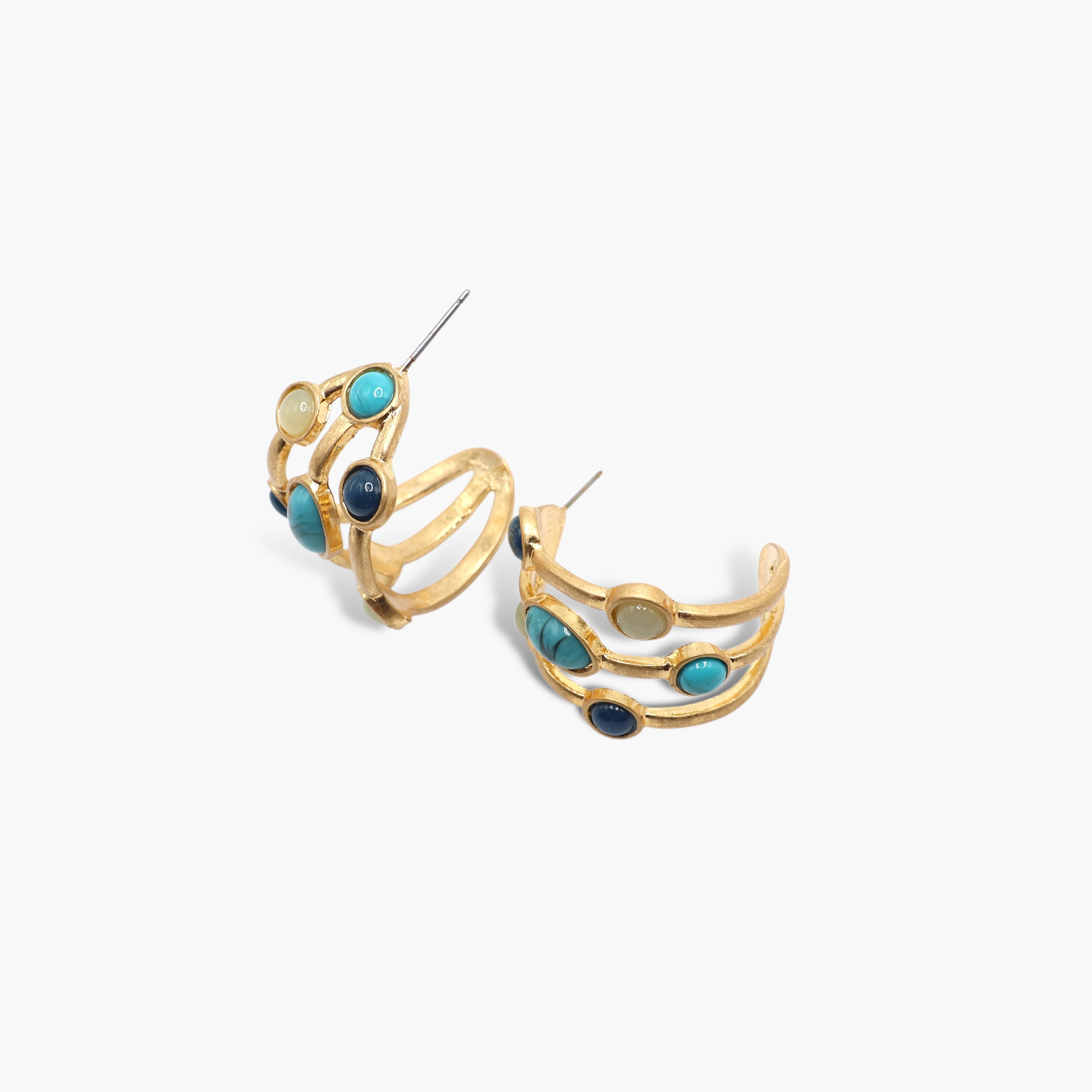 A pair of gold-toned half hoop earrings with turquoise stones and small gold accents.