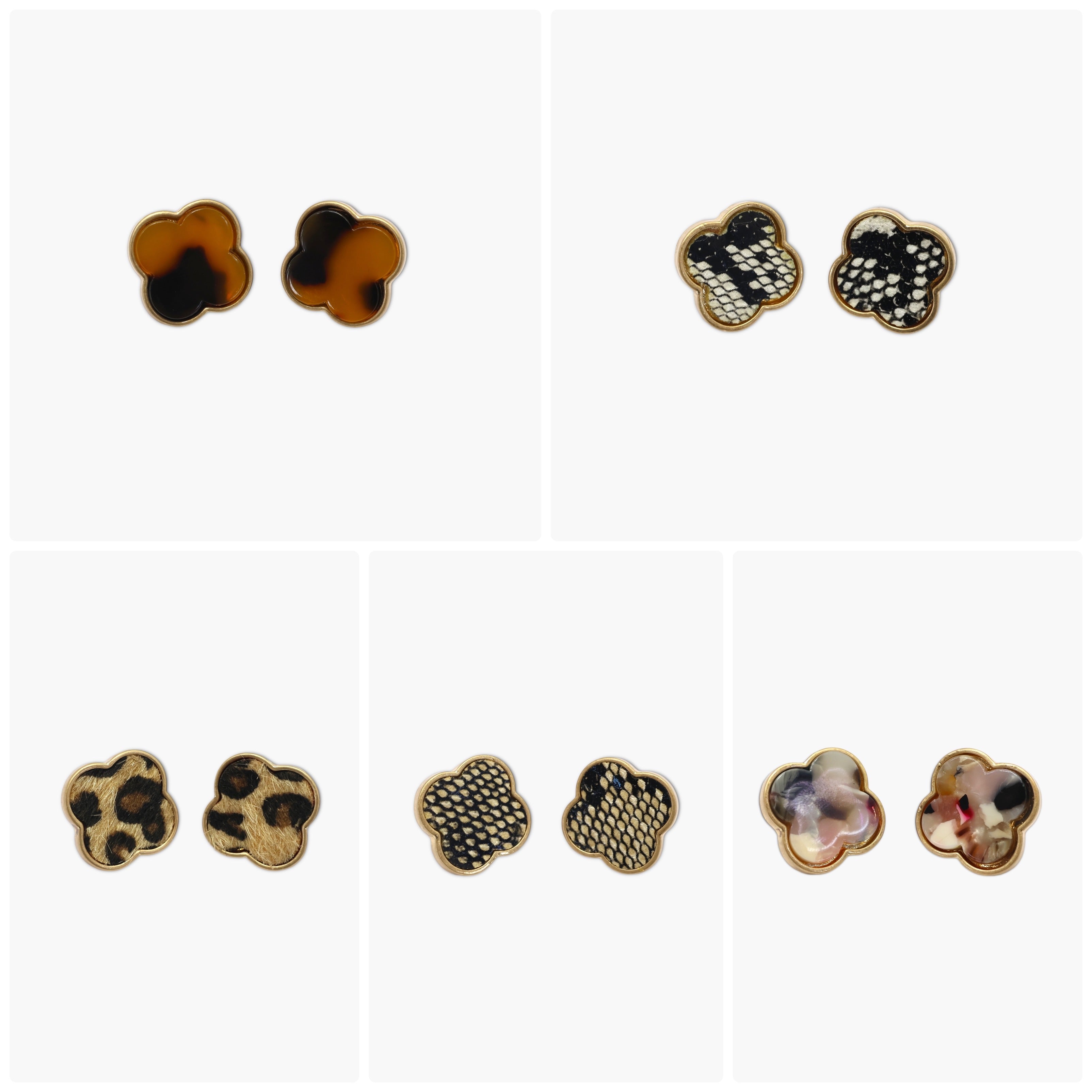 A collection of vintage style earrings with various patterns including floral, geometric, and animal prints.