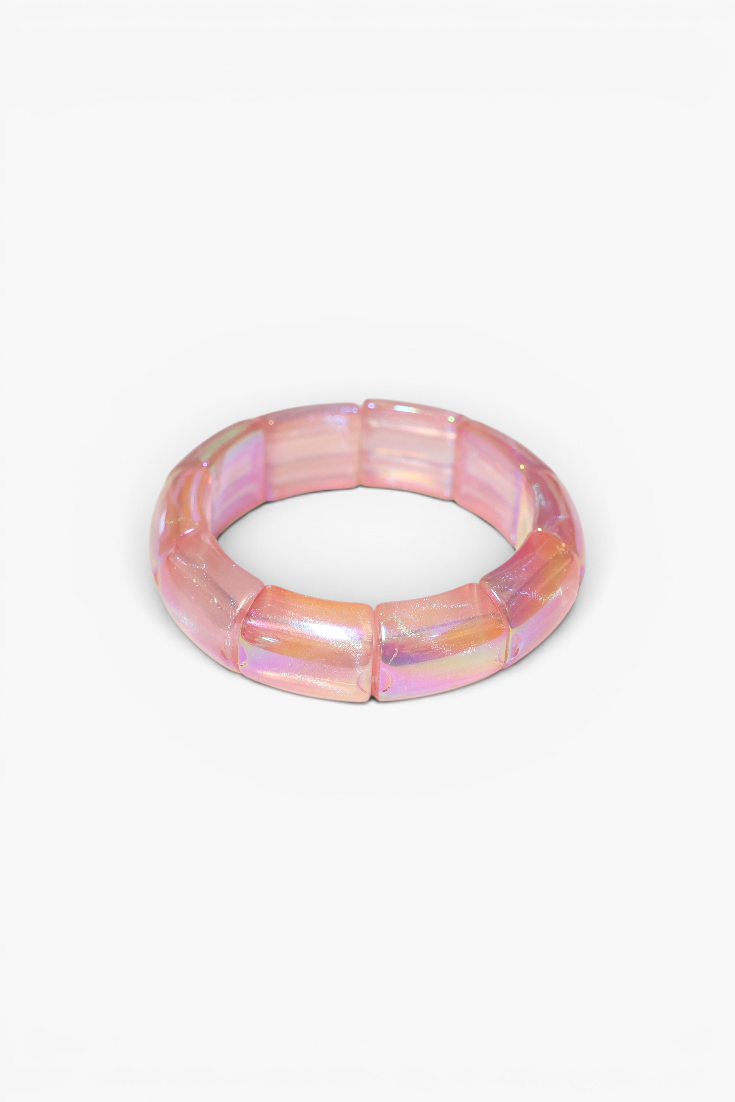 Pink and purple iridescent bracelet on a white background