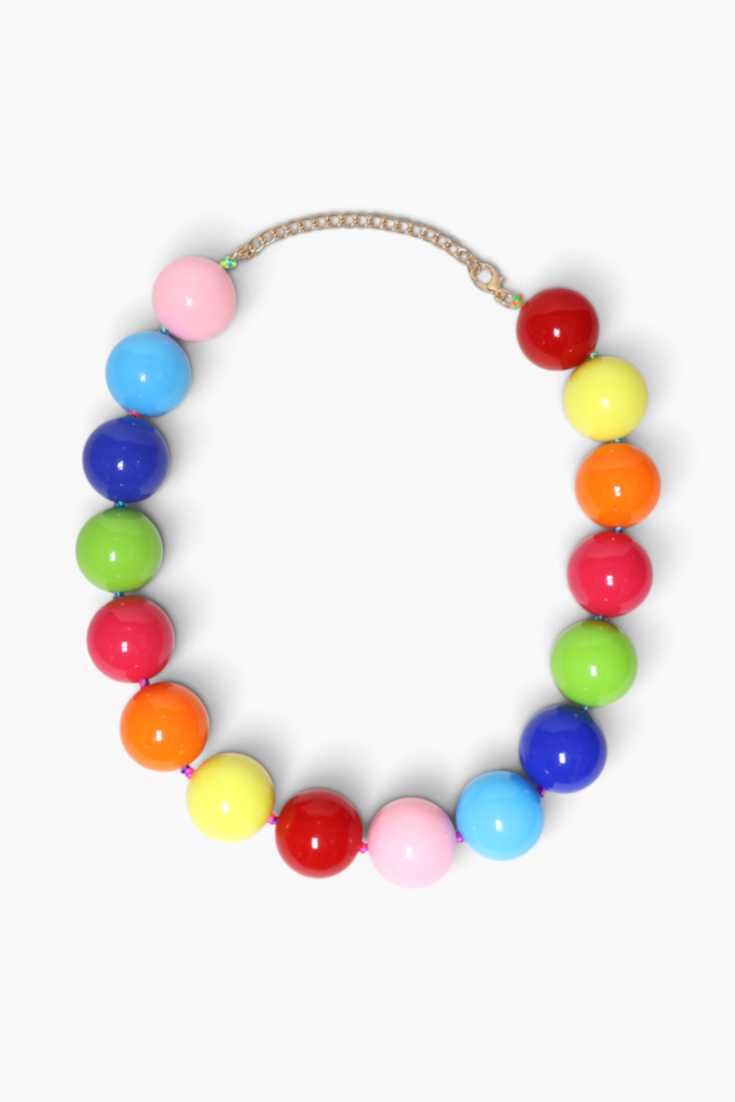 A colorful beaded necklace with glossy spherical beads in pink, blue, red, yellow, orange, and green, connected by a gold-tone chain, shown on a light gray background.