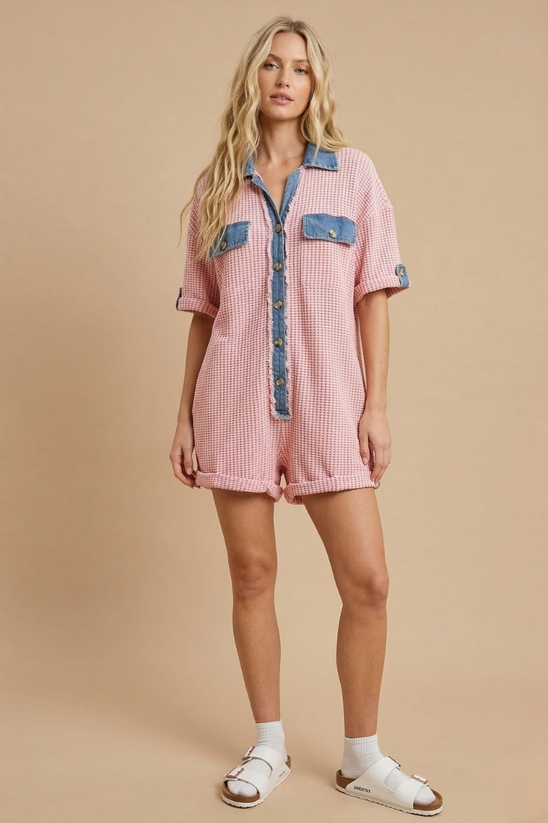 Women’s waffle knit button front romper with collared neckline, utility pockets, rolled short sleeves, and relaxed fit casual one-piece outfit for boutique fashion.