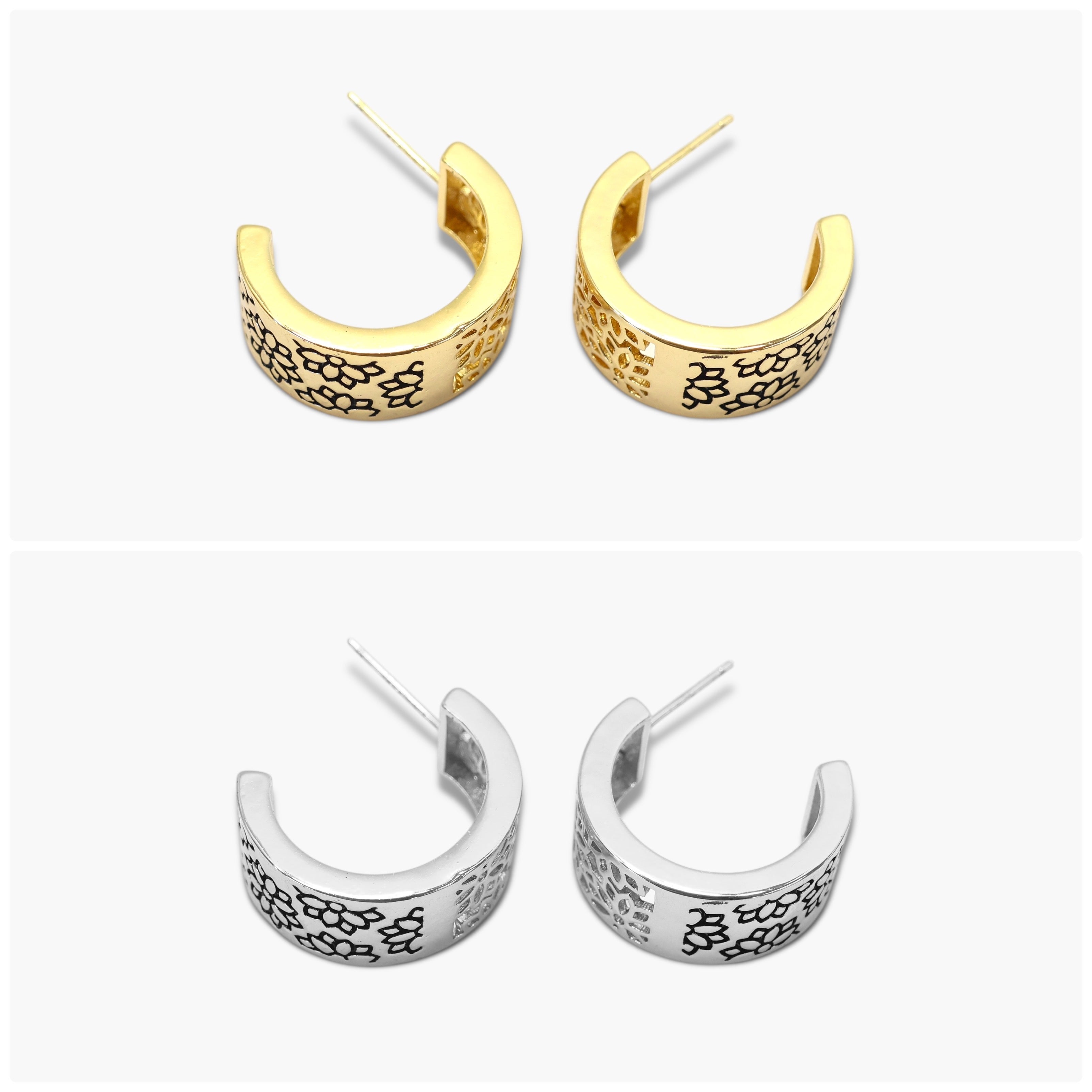 A pair of gold-colored hoop earrings with a floral pattern on the hoop.