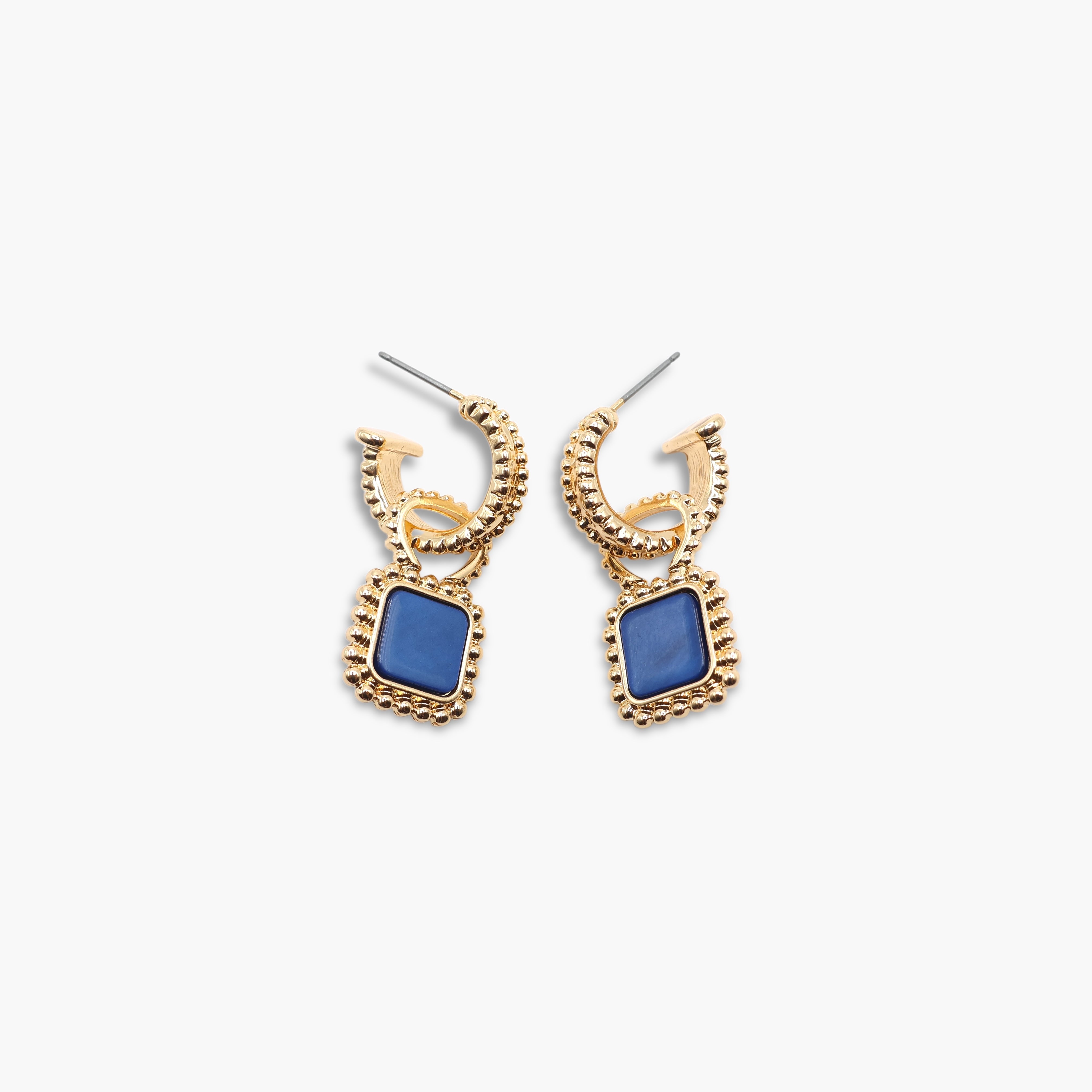 A pair of gold-colored hoop earrings with square-shaped gemstones attached to the hoops.