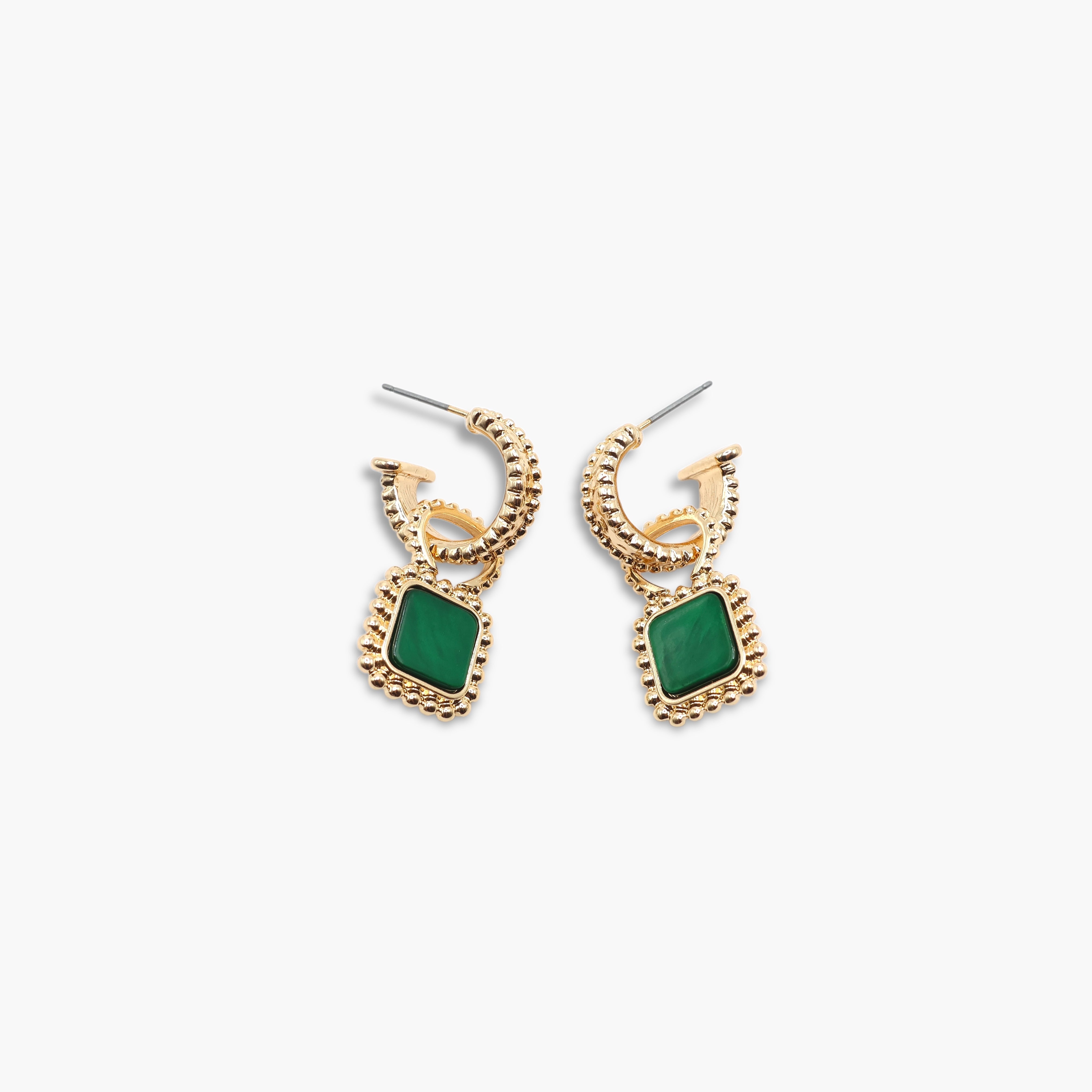 A pair of gold-colored hoop earrings with square-shaped gemstones attached to the hoops.