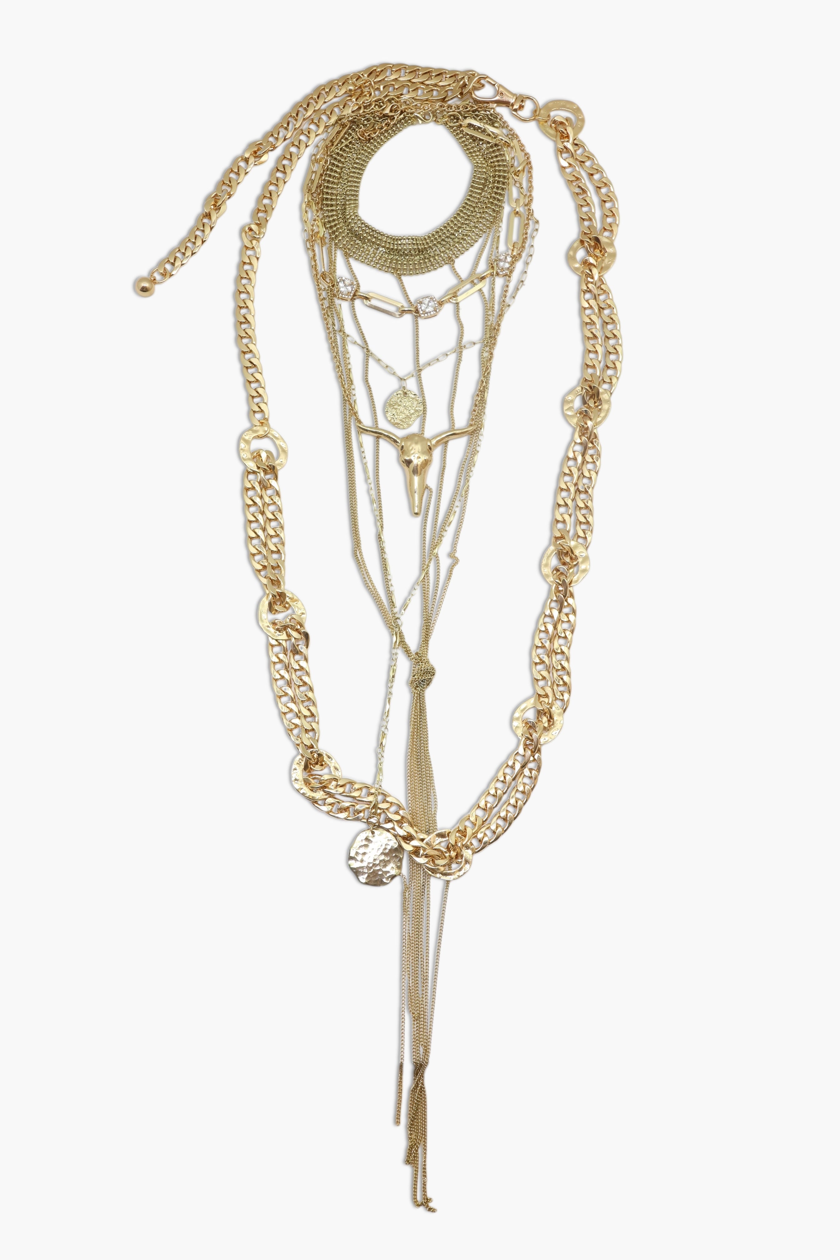 A gold-colored long horn necklace with multiple layers and chain details.
