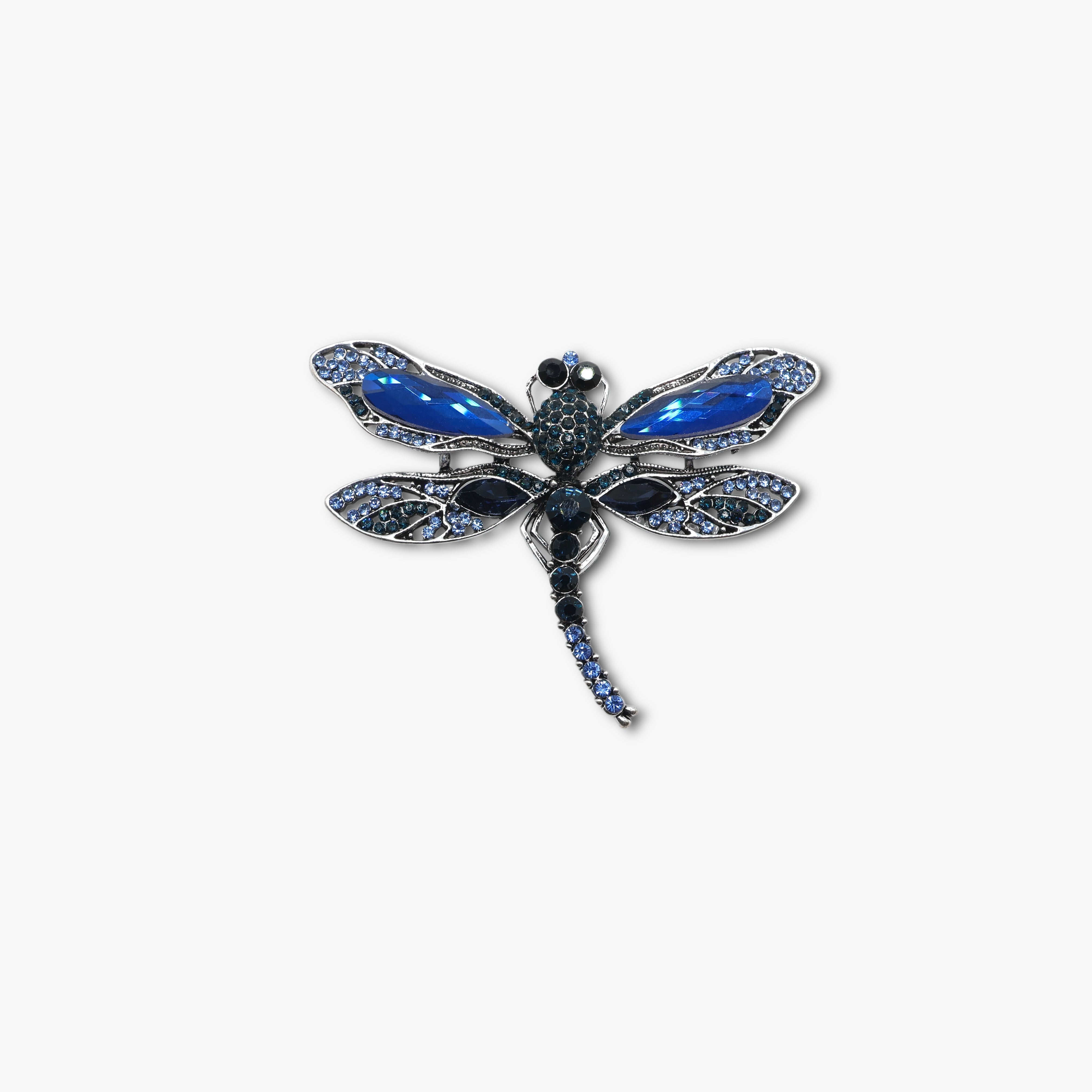 Decorative dragonfly with blue wings on a white background