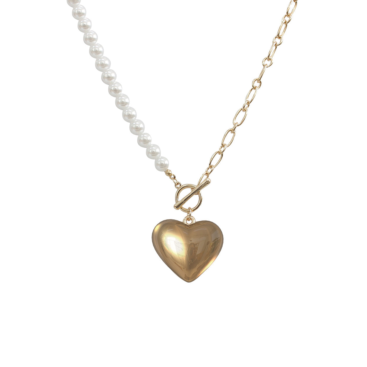 Necklace with heart-shaped gold pendant and pearl chain on a white background