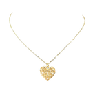 Gold heart-shaped pendant necklace on a white background