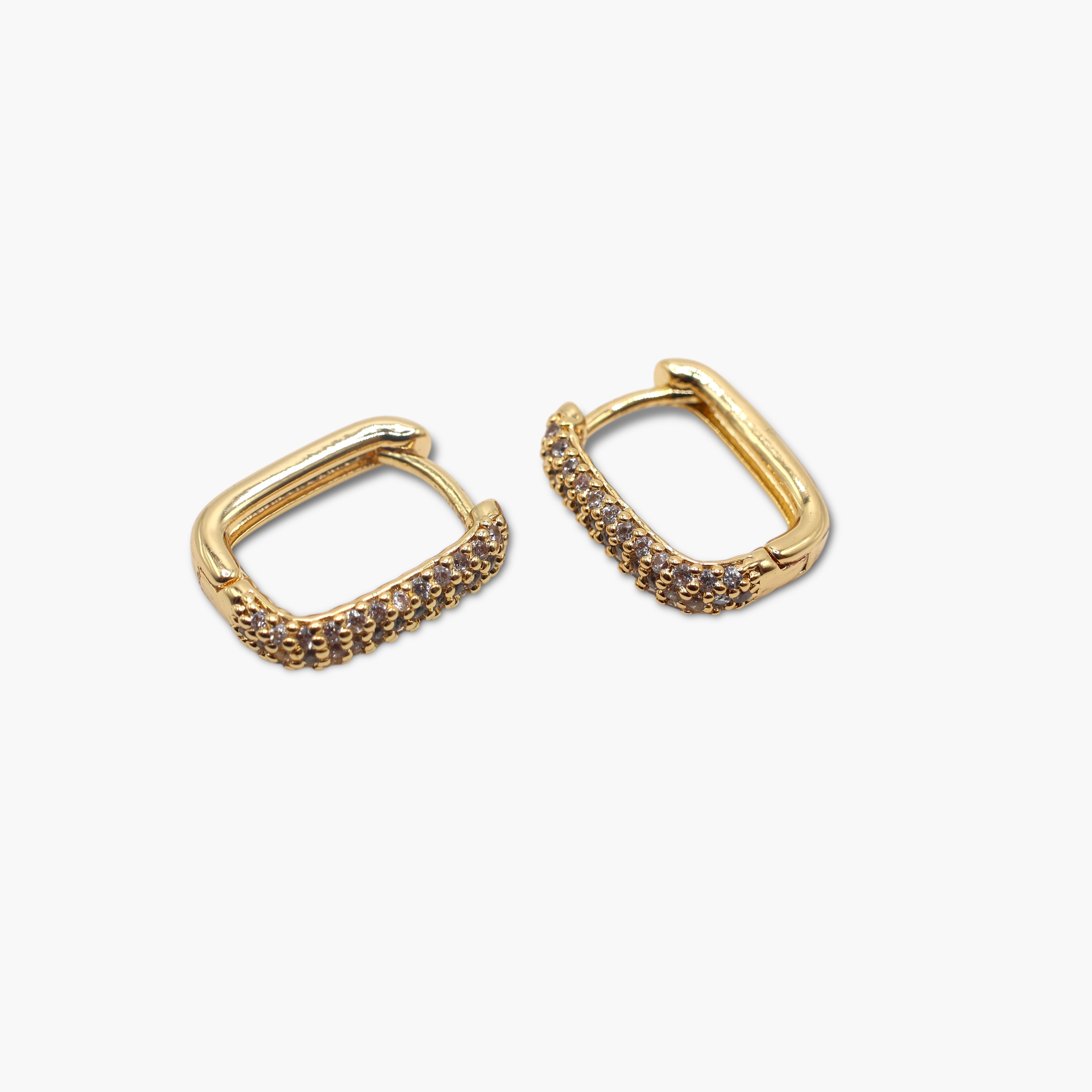 A pair of square-shaped mini hinge hoop earrings with a gold-tone finish.