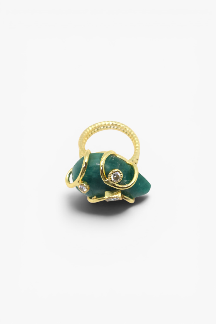 Natural stone statement ring with crystal accents in a gold-tone setting featuring an organic gemstone centerpiece.