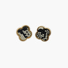 A pair of vintage-style animal post earrings with a brown and black color scheme.