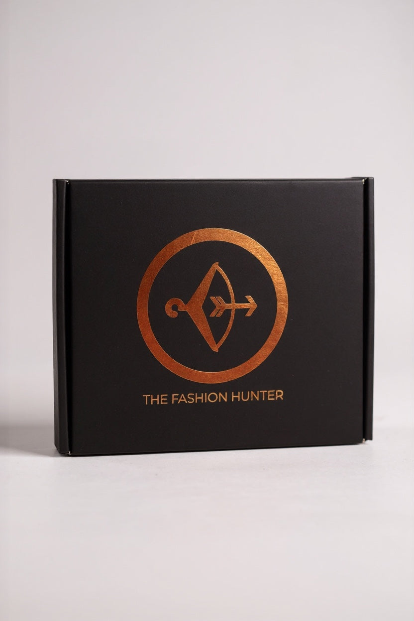 Black box with 'The Fashion Hunter' logo on a white background
