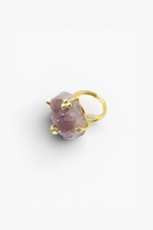 Raw natural stone statement ring with gold-tone band and organic handcrafted design.