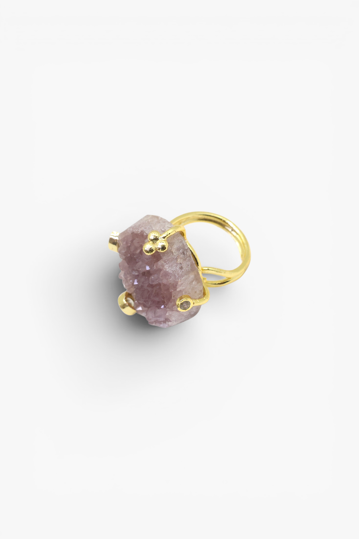 Raw natural stone statement ring with gold-tone band and organic handcrafted design.